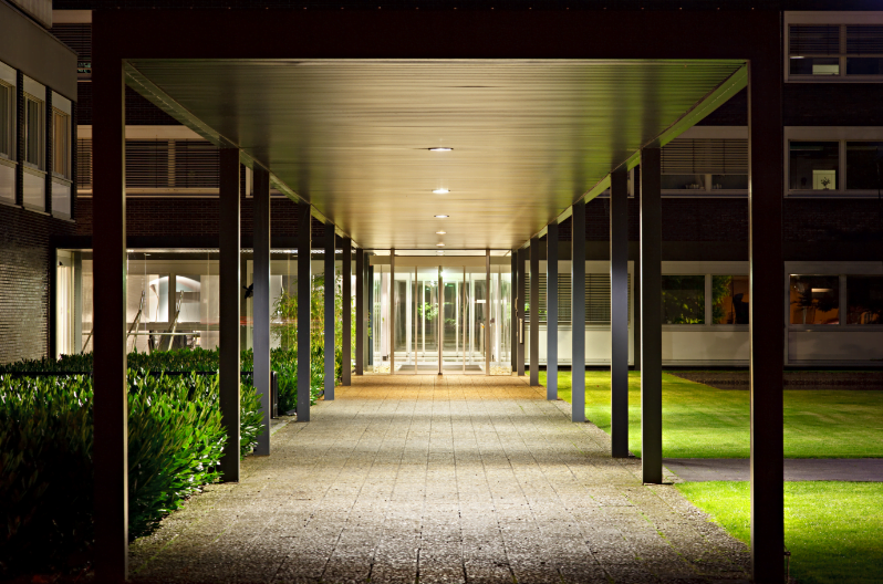 roofed-office-building-entrance-at-night-PCZQRCE